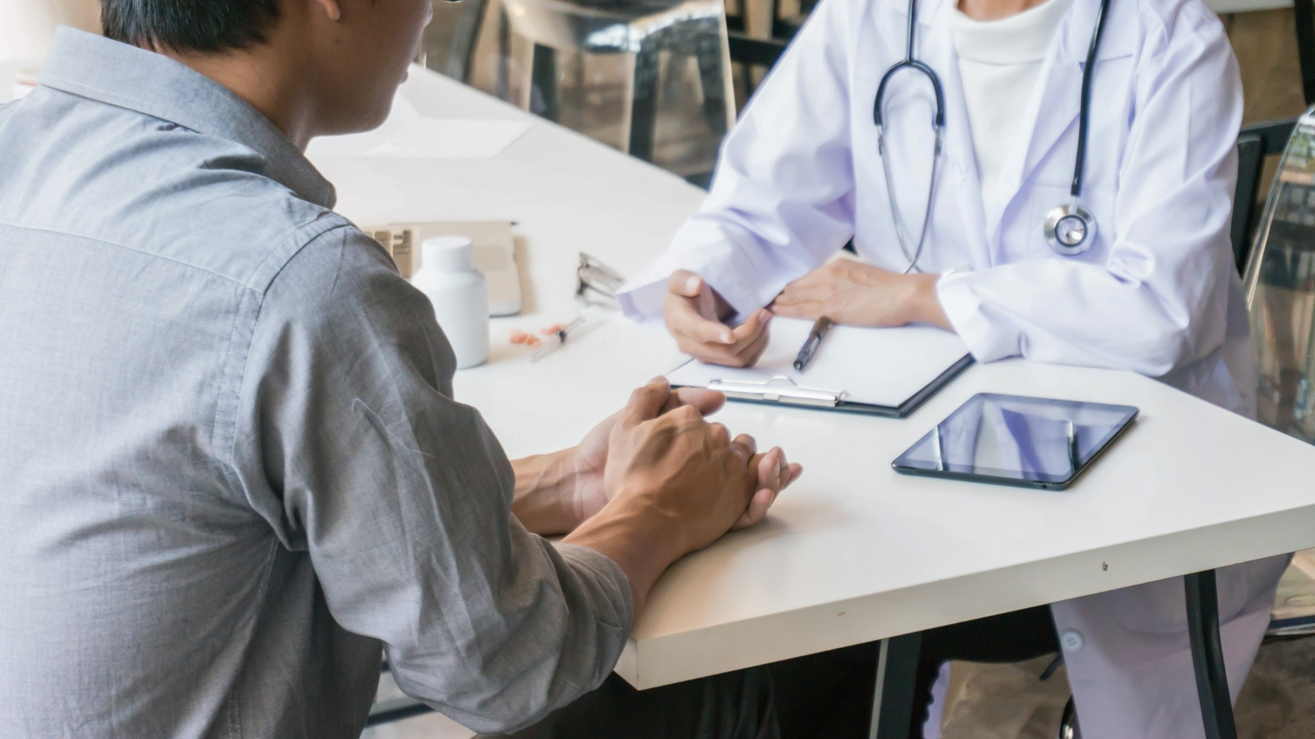 Doctor speaking with a patient