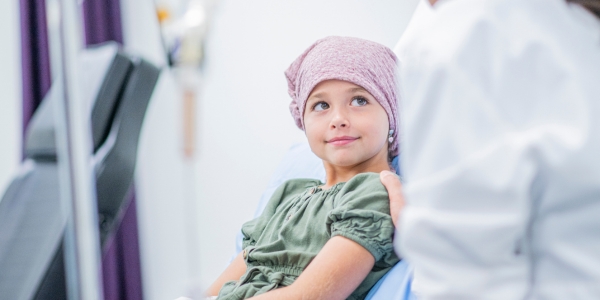 Child seated with a doctor